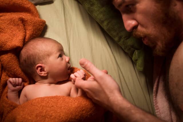 Baby gazing at dad